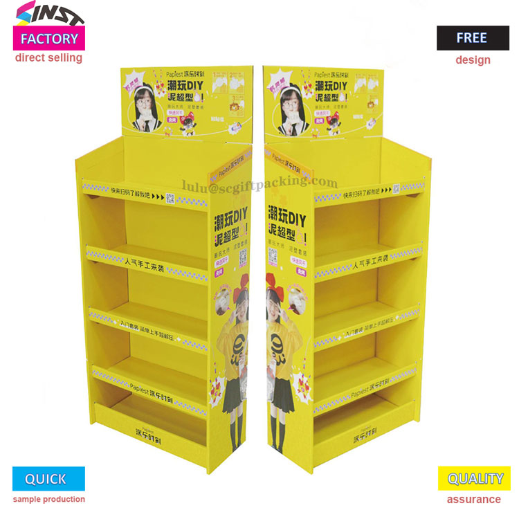 Maža geltona kartoninė vitrinų lentyna prekybos centre dega!